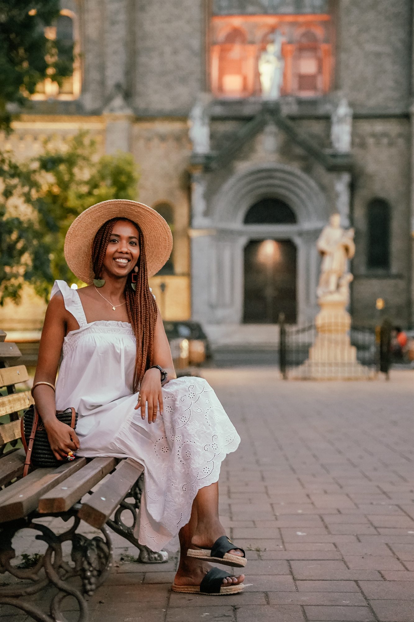 Adna Osman sitting outdoors